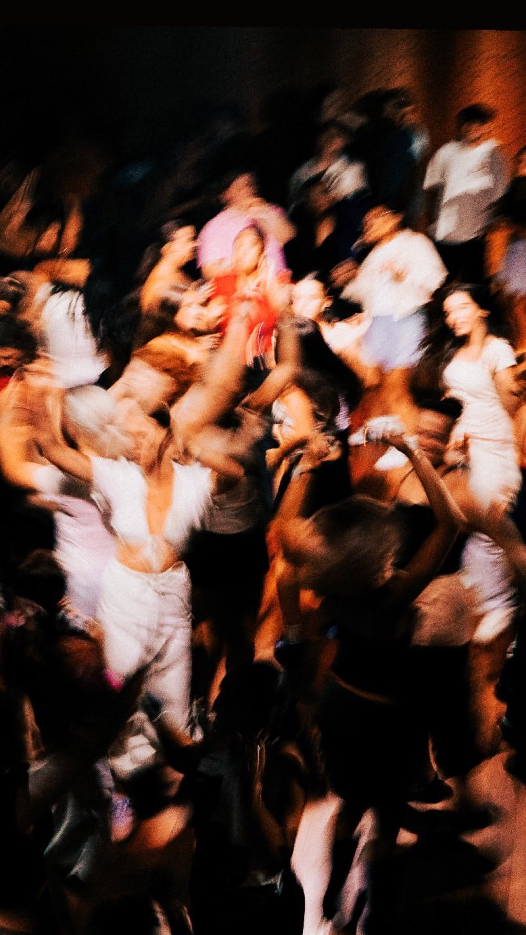 A crowded room, late in the night